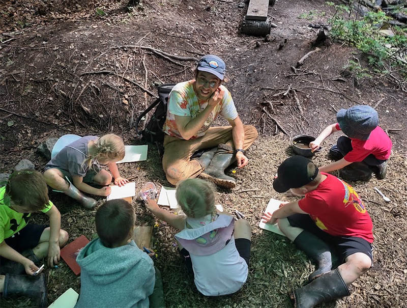 Sampson Vassallo with children enrolled in the forest school